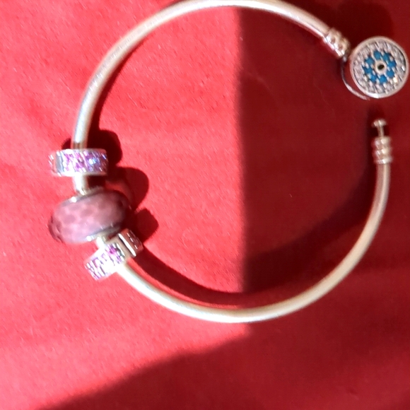 Pandora Jewelry - Pandora sterling silver bangle bracelet w two cz panda clips and Pandora charms.